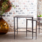 A very nice pair of brown tables.