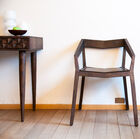 Bellissima poltrona vintage dalle linee lavorate.