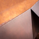 The metal base has a beautiful triangular shape.