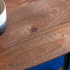 A solid wood top protected by a dark varnish