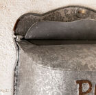 Can also be secured by a padlock positioned on top.