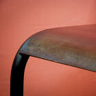 The lightly patinated finish gives it a distinctive raw look.