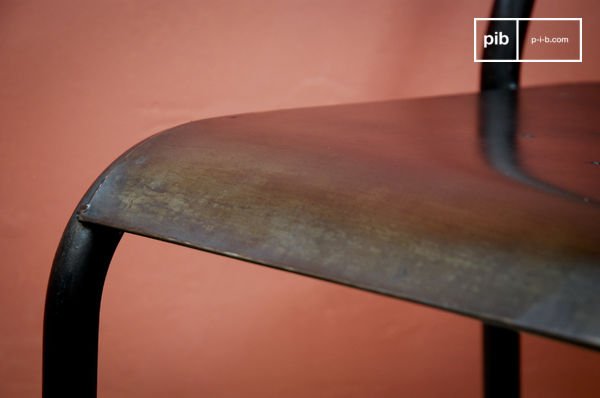 The lightly patinated finish gives it a distinctive raw look.