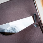 Joli cordon qui permet de maintenir la poche de rangement.