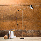 Large black and gold metal reading light.