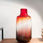 The gradient colours bring a vintage style to the vase.