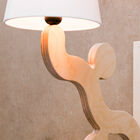 The wooden structure matches the white lampshade.