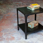 A pretty side table entirely made of metal.