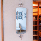 Wall mirror silver plated, adjustable on vertical axis.