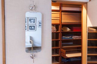 Robin brass rotating wall mirror