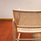 Backrest of the chair with the natural details of solid wood.