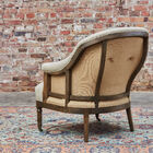 Het frame van de ronde Leonie fauteuil is