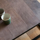 Dark brown leather has a superb raw and organic appearance.