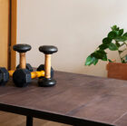 The natural chocolate leather gives the table a subtle cachet.