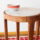 The marble is nicely inlaid in the base.