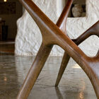 The four legs come together in continuous curves.