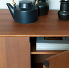 Inside there is a shelf that can be adjusted on several levels.