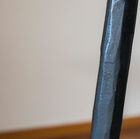 Pretty organic legs in matt black metal, hand hammered.