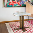 An elegant coffee table made of white marble.