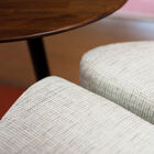 The pouf fits perfectly into the table base.