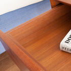 Interior of the drawer with pretty all-wood finishes.