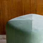 The fabric can have a range of shades from light green to mint green.