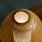 Enjoy the work of weaving bamboo that contribute to this trendy lamp's lightness