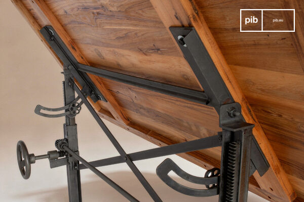 It rests on a heavy cast steel base equipped with a rack and pinion system