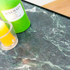 Deep green marble top with white veins.