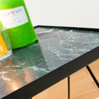 Beautiful contrast of the green varnished tray and the matt black structure.