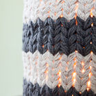 The light is diffused lightly through the mesh.