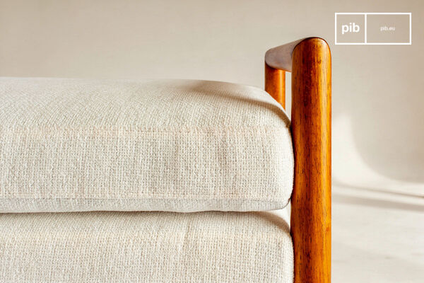 This bench features a solid rubberwood frame with an amber hue and a satin finish that reveals the