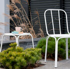 Pretty white metal chair with a Scandinavian design.