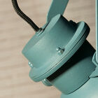 The colour varies between petroleum blue and duck green.