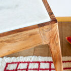 A beautiful contrast is created between white marble and wood.