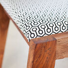 Successful combination of wood and printed fabric.