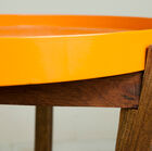 Its flanged top can be removed so you can take all the glasses and coffee cups to the kitchen in one