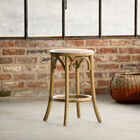 A resolutely bohemian stool made of solid elm.