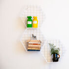 Trio of white wall storage units.