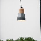 Bois naturel, rondeurs et gris ciment pour une touche de décoration vintage lumineuse