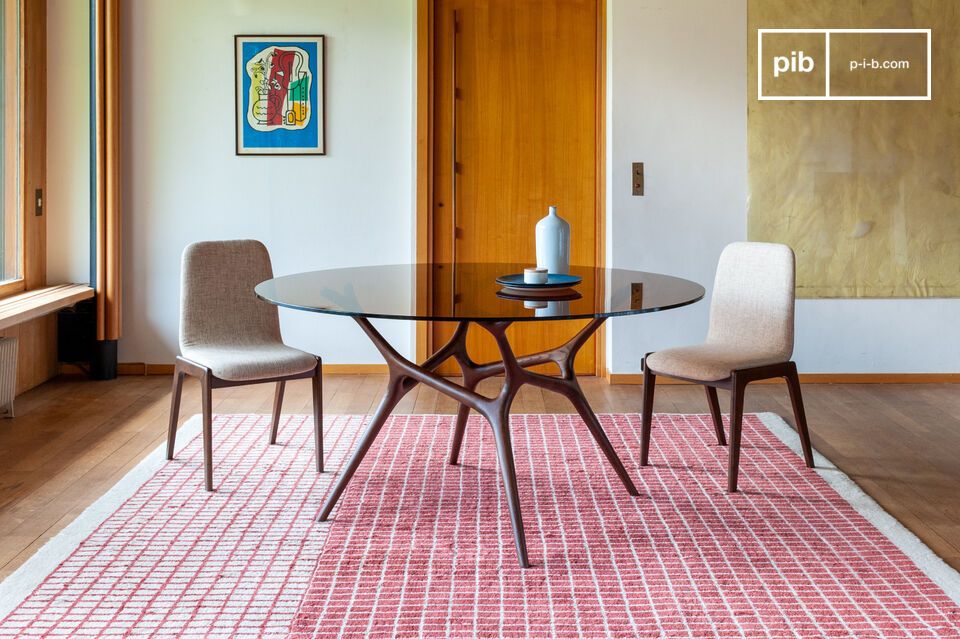 Le plateau est délicatement connecté au support par des pastilles d'inox pratiquement invisibles.