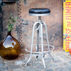 Élégant tabouret haut en métal blanc et cuir noir.