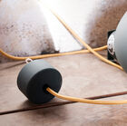 The fixing hook and connection are hidden under a metal cover.