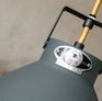 Each ceiling light is numbered using a unique riveted firm plate.