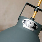 Each ceiling light is numbered using a unique riveted firm plate.