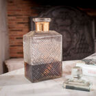 Pretty diamond patterns are present on the decanter.