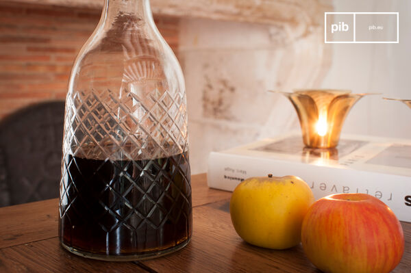 The decanter has beautiful geometric patterns.