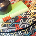 Cylindrical pouf with very neat finishes.