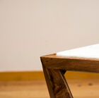 The shelf appears to be embedded in the wooden structure.