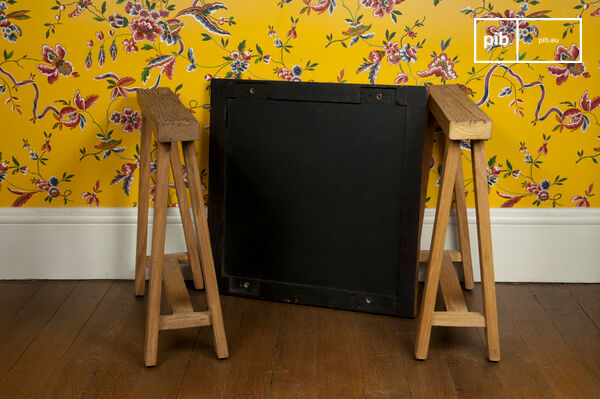 This table trestle is a practical little piece of furniture that proudly displays its noble wooden